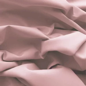 présentation de la popeline oeko tex unie rose nude sur une table